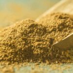 ground-cumin-powder-in-wooden-spoon--1156760490-148fa2fc05fc4948ba86f71bbf893302